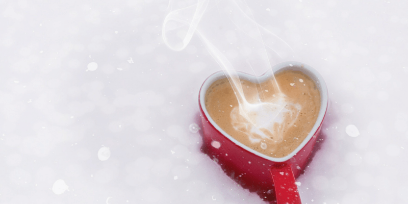 Ann Peck says Coffee shows love with a red heart shaped coffee much